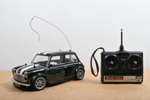 OVER MINI COOPER: A 1:10 scale radio control Mini Cooper front wheel drive racing car by TAMIYA