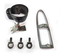 DB4: An Instrument column boss. A tail light frame. Interior waist strip end covers. Three safety belt bolts. A left hand lower door finisher trip - 3