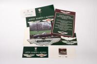 ASTON MARTIN LAGONDA: An ASTON MARTIN LAGONDA folder. Folder with brochures, Aston Martin emblem adhesives