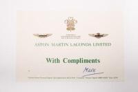 ASTON MARTIN LAGONDA: An ASTON MARTIN LAGONDA folder. Folder with brochures, Aston Martin emblem adhesives - 2