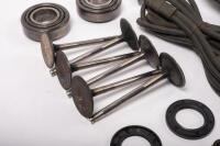 DB6: A collection of Aston Martin DB6 parts including a new pair of steering rack mounts, pair of electric cables for Selecta-Ride shock absorbers, as well as selection of used parts such as conrod nuts and bolts, valves, springs, collets, timing chains, - 3