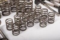 DB6: A collection of Aston Martin DB6 parts including a new pair of steering rack mounts, pair of electric cables for Selecta-Ride shock absorbers, as well as selection of used parts such as conrod nuts and bolts, valves, springs, collets, timing chains, - 6