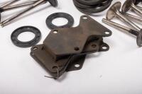 DB6: A collection of Aston Martin DB6 parts including a new pair of steering rack mounts, pair of electric cables for Selecta-Ride shock absorbers, as well as selection of used parts such as conrod nuts and bolts, valves, springs, collets, timing chains, - 7