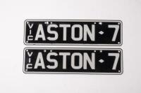 ASTON MARTIN: A set of black and white, Victorian slim line plates - 'ASTON 7' - with rights to display - 2