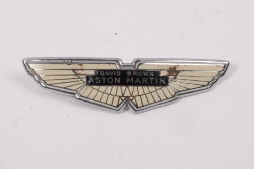 176 · DB4/5/6: An original, second hand ASTON MARTIN DAVID BROWN boot badge in silver. Part No 03-004-00353