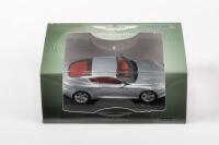 DB9: A diecast&nbsp;1:43&nbsp;scale Oxford&nbsp;Aston Martin DB9&nbsp;coupe, in original box