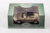 Aston: A diecast&nbsp;1:43&nbsp;scale Oxford&nbsp;Aston Martin Vanquish&nbsp;coupe Selene Bronze, in original box
