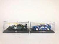 SCALEXTRIX: Two unused 1:32 scale Scalextrix slot cars. Aston Martin Racing DBR9 and Nissan Skyline GTR - 2