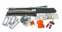 DBS/AMV8: Front lamps and parts. Including three engine dipsticks, one AMV8 RH bonnet pad, one prototype AMV8 Vantage bonnet scoop infill - 2