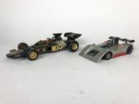 RACE CARS: Two race car models. F1 and Can-Am