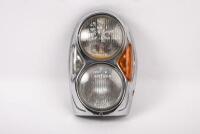 280SE: A circa 1969-70 Mercedes 280SE Bosch headlight and surround, chip in top lens & amber light and dent in chrome surround