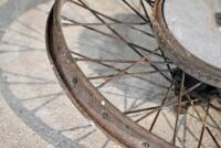 DOUGLAS: A 40&nbsp;spoke 20" rear wheel with brake drum complete with axle which spins, beaded rim, believed to be Douglas Model EW [Sydney] - 4
