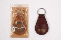 ASTON MARTIN: Four items of Aston Martin paraphernalia. STRAND green handmade leather ASTON MARTIN notecase - 2