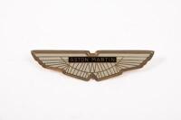 AMV8: An original, second hand gold Aston Martin AMV8 boot/bonnet badge, suitable for Aston Martin AM V8 1972 to 1989