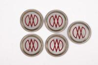 AM V8: Five new old stock Aston Martin AM V8 centre wheel badges. Suitable for Aston Martin AM V8 and DBS from 1972 to 1989. Part No. 092-036-0005