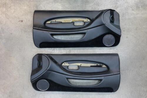 DB7: A pair of circa late 1990s DB7 model black leather door trims