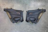 DB7: A pair of left and right side, circa late 1990s DB7 model, black leather interior quarter panel trims