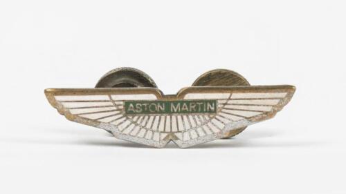DB7: A circa late 1990s - early 2000s DB7 Vantage model centre dash Aston Martin winged badge