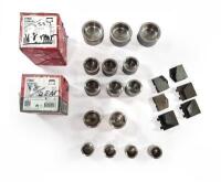 GIRLING BRAKE PISTONS: For 6 cylinder and V8 cars. Fifteen NOS pistons. Two sets of V8 rear brake pads and one box of six used handbrake pads.