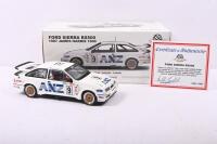 MOFFAT: A 1:18 scale Ford Sierra RS500 as raced in 1987 James Hardie 1000 by Allan Moffat, Andy Rouse, & Thierry Tassin. Autoart Allan Moffat Collection (Item No. 88712)