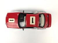 NISSAN: A 1:18 scale Biante Nissan Skyline GTR as raced by Mark Skaife/Jim Richards. L.E 1958/4626 - 7