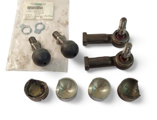 DB4: Two NOS brake reaction tabs, two NOS and two used brake reaction ball retainers, two brake reaction balls and two used tie rod ends.