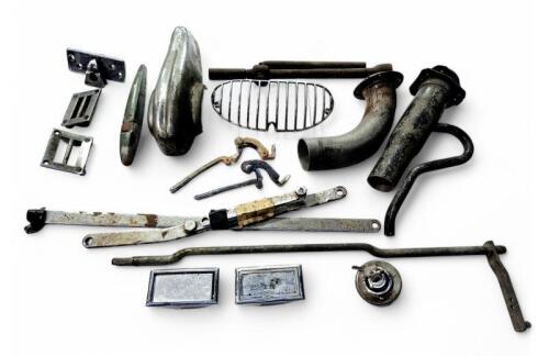 DB2: Box of parts included ignition assembly with key, ashtrays, bonnet intake grill etc.