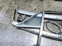 DBS/V8: Left hand door frame including quarter glass, two front bumper bars DBS/V8, one air-conditioning vent piece, three cables, one right hand front DB6 bumper bar shell. - 2
