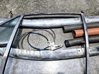 DBS/V8: Left hand door frame including quarter glass, two front bumper bars DBS/V8, one air-conditioning vent piece, three cables, one right hand front DB6 bumper bar shell. - 3