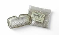 DB6: An Aston Martin DB6 NOS Reverse lamp lens