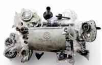 GEARBOX: An incomplete David Brown 2.6 Lagonda gearbox casing with many gears, shafts and sprockets.