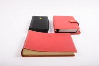 NOTEBOOKS & ORGANIZERS: A group of three high quality Ferrari branded notebooks/personal organizers - 2