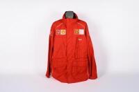 FORMULA ONE: A c2000s Scuderia Ferrari Formula One spray jacket by Fila, size USA Large, Vodafone and Shell sponsorship