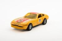 FERRARI DAYTONA: A Ferrari daytona in 1:36 scale, in Le Mans 1973 livery, manufactured in Corgi toys, made in Great Britain