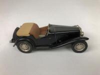BRITISH CAR MODELS: A group of 1:43 scale British model cars - 7