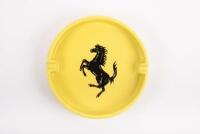 ASHTRAY: A large ceramic yellow Ferrari ashtray as used in distributorships, made in Italy by Bitossi, featuring prancing horse to face, 24cm diameter&nbsp;