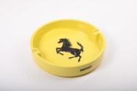 ASHTRAY: A large ceramic yellow Ferrari ashtray as used in distributorships, made in Italy by Bitossi, featuring prancing horse to face, 24cm diameter&nbsp; - 2