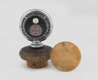 AMERICAN LA FRANCE: An &lsquo;American La&nbsp;France&rsquo; radiator temperature gauge, mounted on brass base, also including&nbsp;a&nbsp;'American La France' badge, 7.5cm diameter - 2