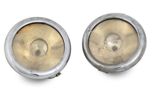 LAMPS: Two early American ‘Gray & Davis’ nickel plated brass head lamps, flat glass 23.5cm diameter (one lens broken), mounting bracket approx. measurement 29cm