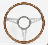 MOTO LITA STEERING WHEEL: A Moto Lita three spoke wooden steering wheel, 35cm in diameter