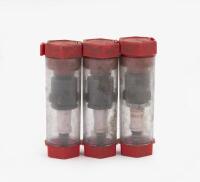 NGK: A group of three NGK spark plugs, marked 'Olympic Aluminum'