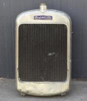 ARROL-JOHNSTON: A circa 1920s Arrol-Johnston radiator with core and surround, marked on reverse with badge 'Marston Mark II Radiator - John Marston Ltd Wolverhampton No. 88879'