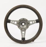 STEERING WHEEL: A Moto-Lita&nbsp;three spoke, leather bound steering wheel, 36cm in diameter