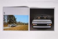 MONDIAL CABRIOLET: A 1984 Ferrari Mondial Cabriolet brochure, grey covers, colour photographic illustrations and engine detail graphic, printed in Italy 1984 - 2
