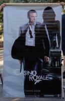 JAMES BOND/CASINO ROYALE: A very large double sided wall banner poster featuring Daniel Craig and an Aston Martin DBS V12 promoting the James Bond&nbsp;film 'Casino Royale', 243cm high, 152cm wide - 2