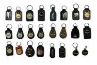 ASTON MARTIN: A selection of 24 Aston Martin related key fobs