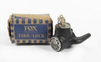 TIRE LOCK: An early Fox universal tire lock, made in the USA, comes with key, original box and instructions,