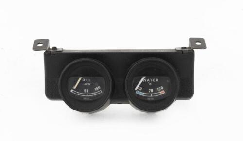 SMITHS UNDER DASH TWIN MOUNT: A Smiths Plastic Under Dash Housing (180x60) with Gauges