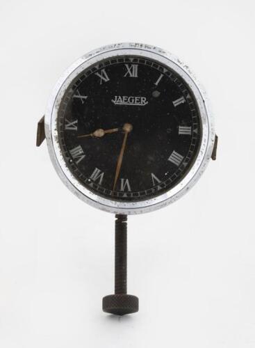 JAEGER: A rare Jaeger clock with white Roman numerals on black face, 8.5cm in diameter