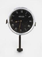 JAEGER: A rare Jaeger clock with white Roman numerals on black face, 8.5cm in diameter